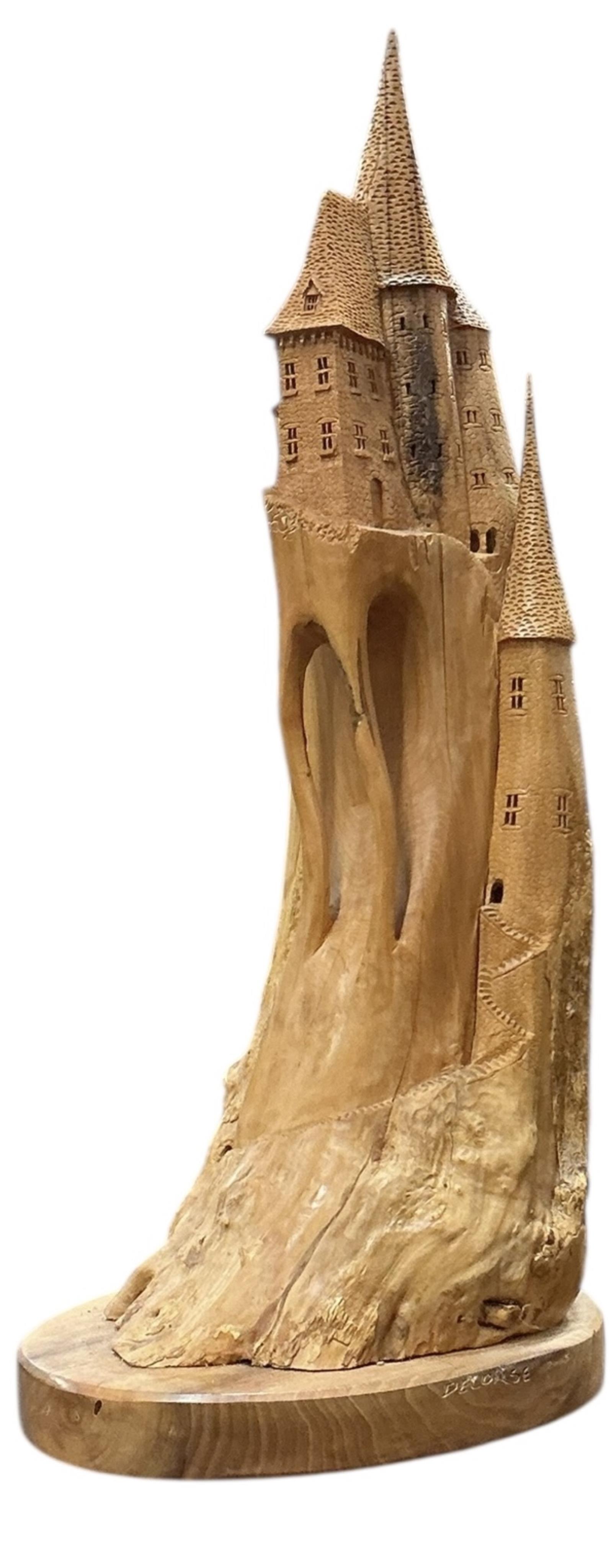 Pierre Decorse (b.1953), a naturalistically modelled sculpture of a fairytale castle emanating from rocks, height 84cm